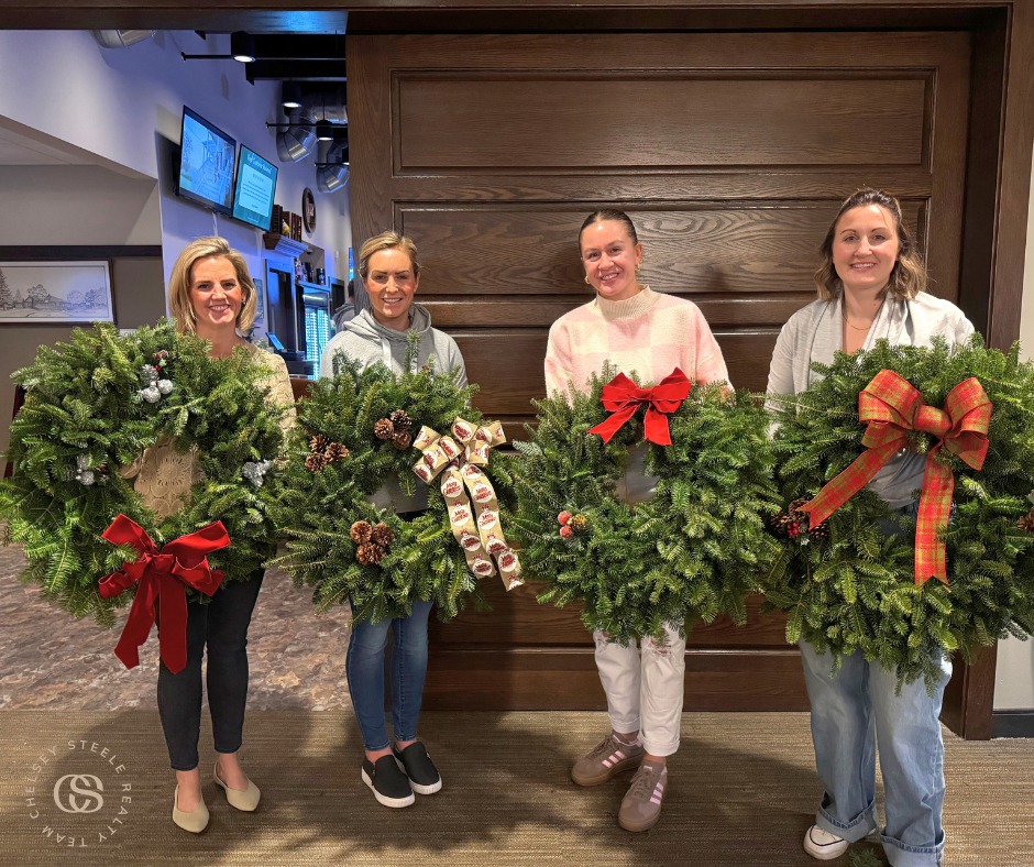 Four Women with Christmas Wreaths
